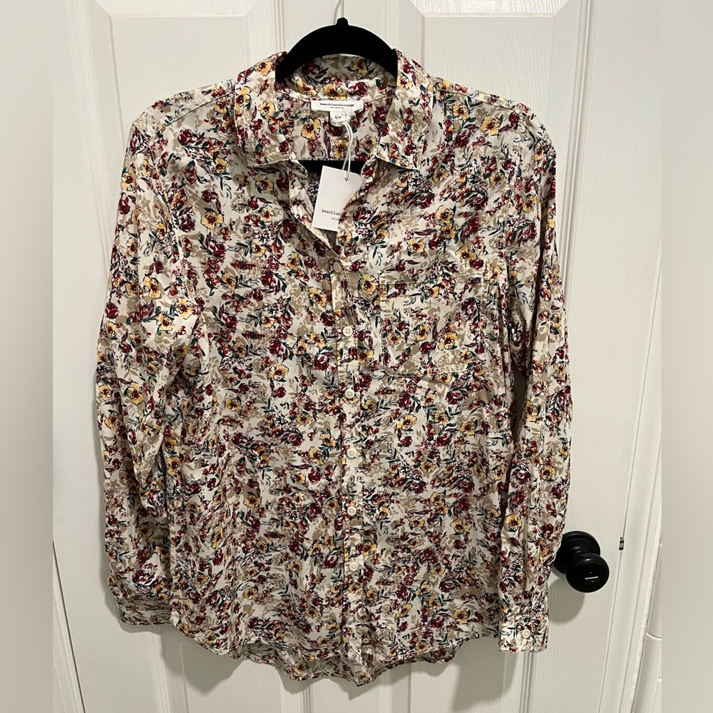 Women’s button down shirt.
